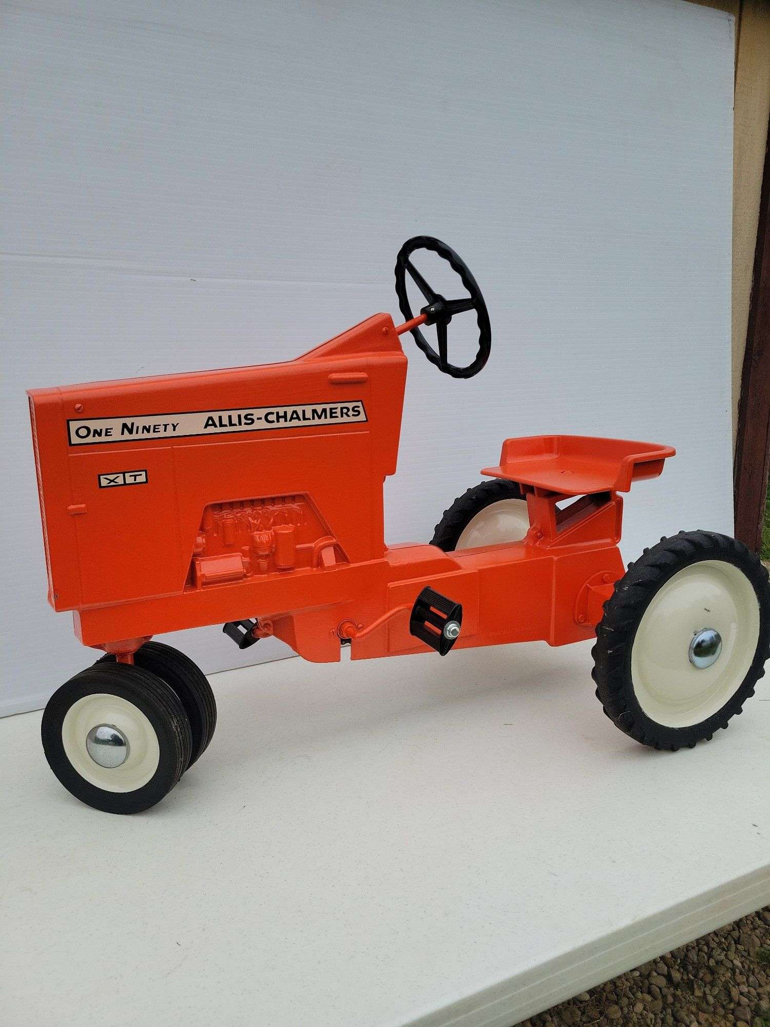 Allis-Chalmers one Ninety XT pedal tractor - Kaufman Realty & Auctions