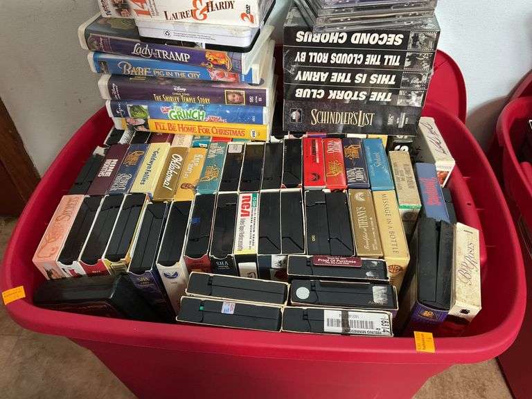 Assortment of VHS Tapes and CDs