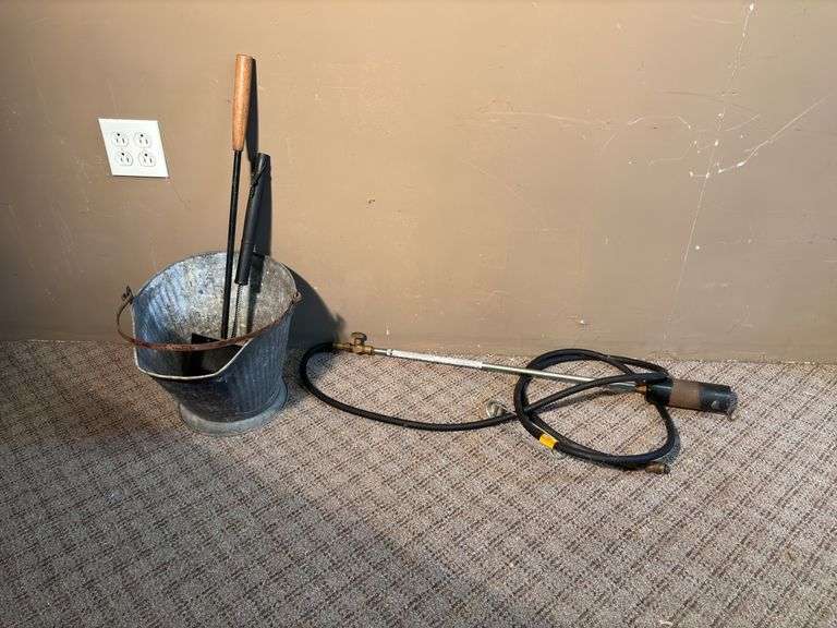 Blow torch , coal bucket