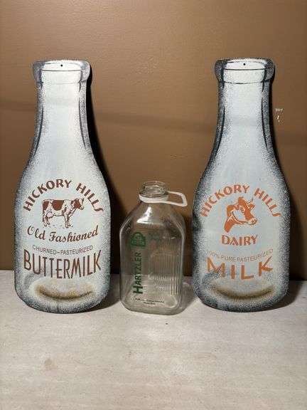 2 vintage milk signs 19.5” High , Hartzler milk jug