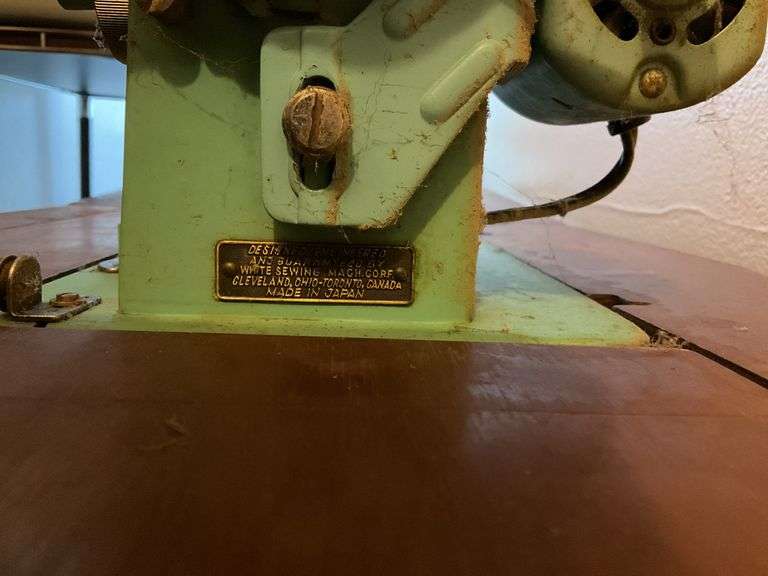 Vintage White Sewing Machine in Cabinet
