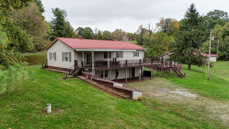 17.3 +/- Acres with Home & Outbuildings