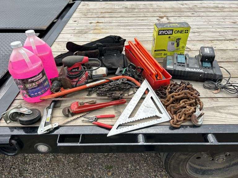 Tool belt, small chains, chainsaw blades, Ryobi sprayer, Makita battery charger, handheld saw & more