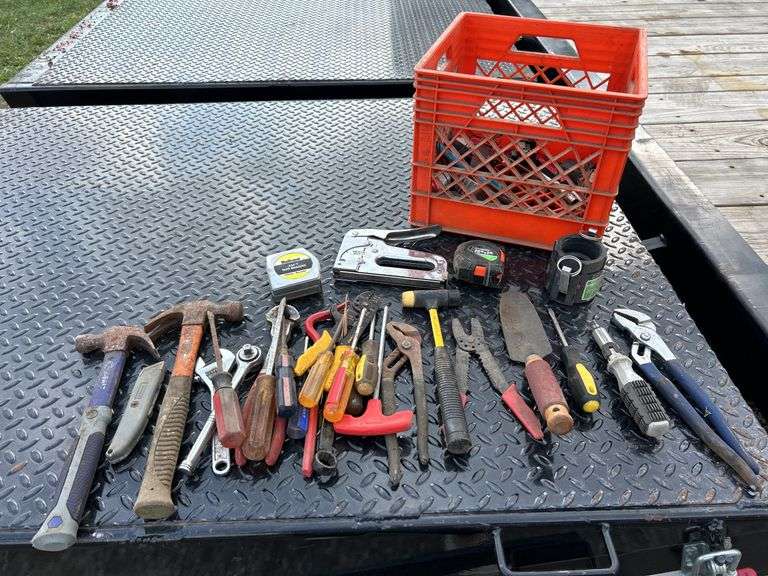 Crate w/ tools including hammers, screwdrivers, staple gun, tape measure and more