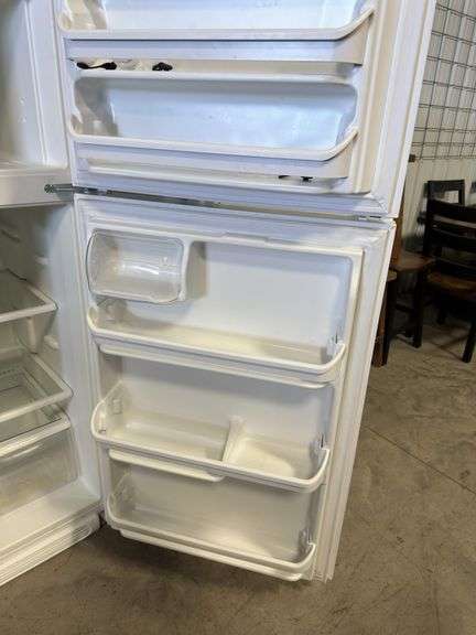 Frigidaire top freezer refrigerator - Kaufman Realty & Auctions
