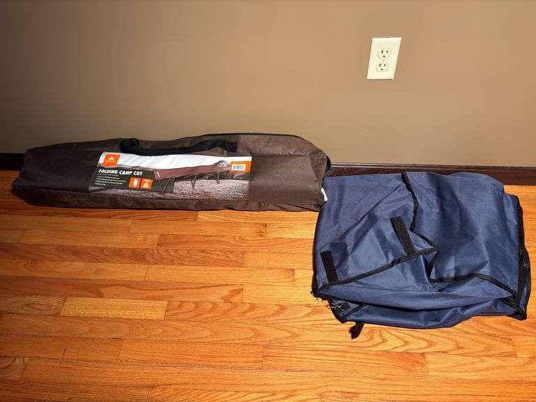 Folding camp cot , garment bag