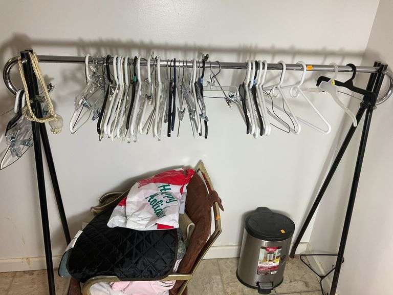 Clothes Hanging Rack, Clothes Hangers, Trash Can, Chair with Contents