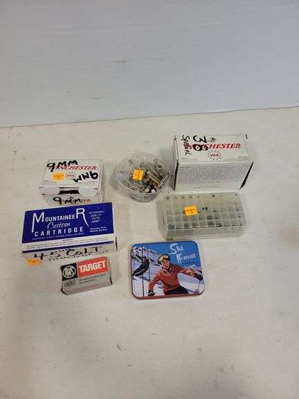 Box of Misc. Ammo - 45 Long Colt, 38 Spec., 9mm, a wallet and Misc.