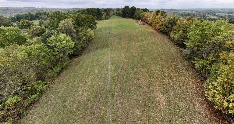 9.1 +/- Acres mostly hayfield, with hilltop setting, some woods, Nice building site