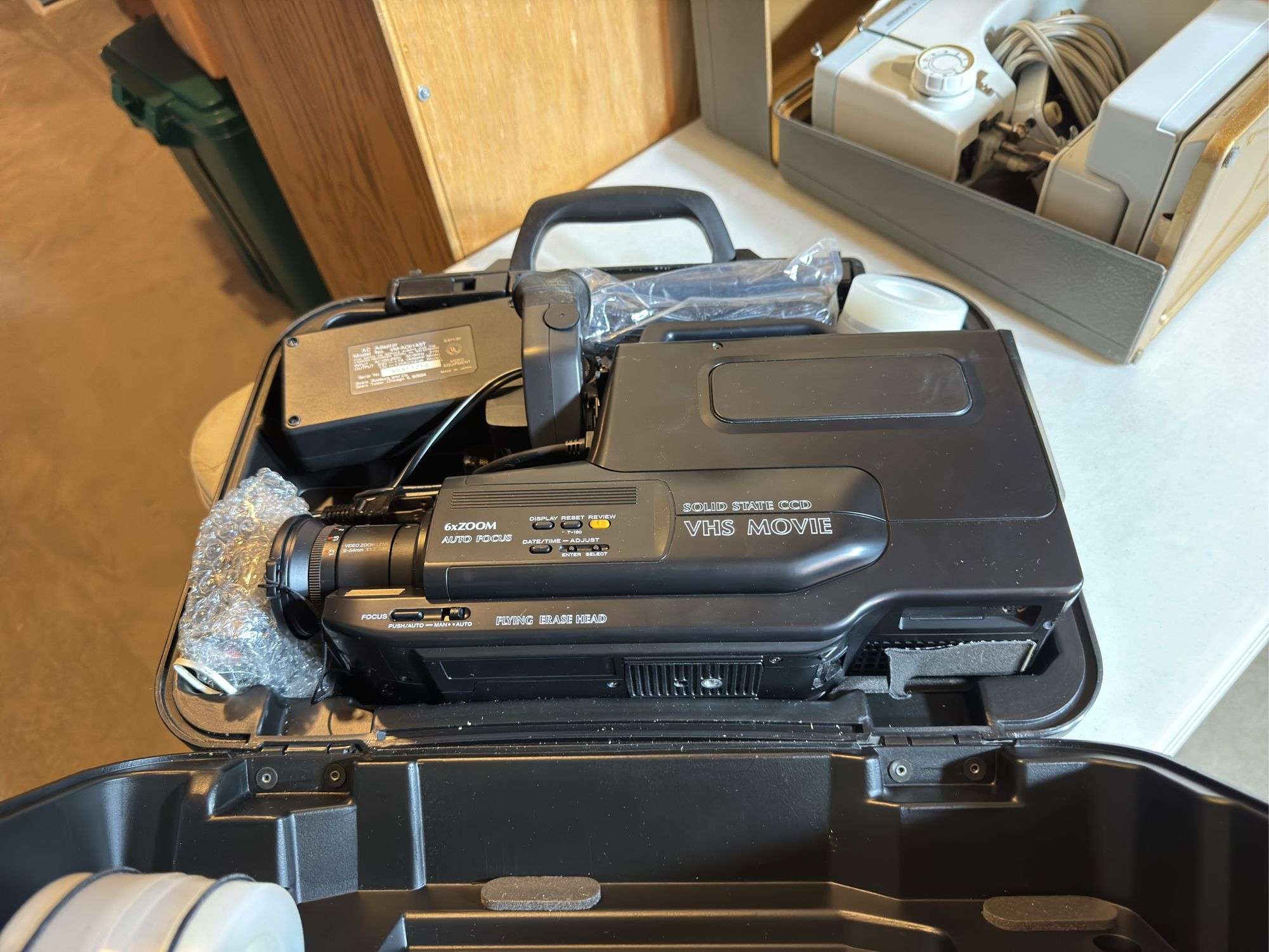 Untested Sears Roebuck VHS Movie Recorder & Elna Super Sewing Machine.