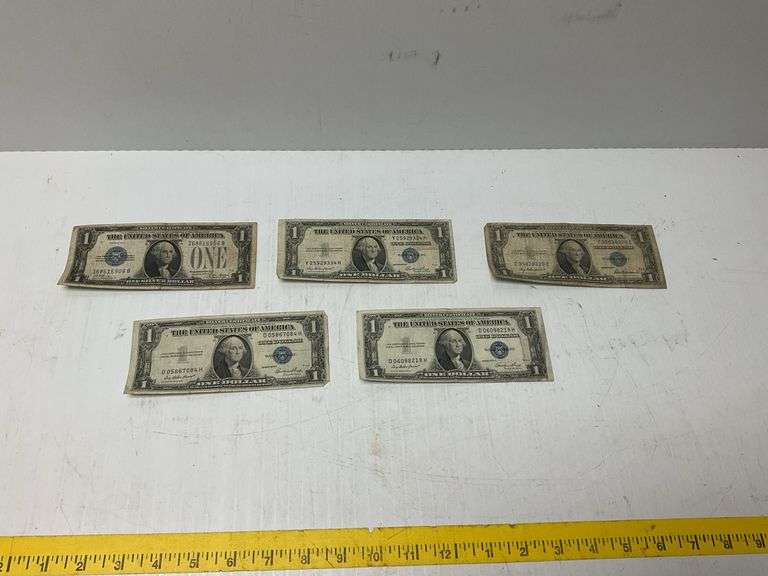 (3) 1935 G $1 Blue Seal Silver Certificates, (1) 1935 F $1 Blue Seal Silver Certificate, and (1) 192
