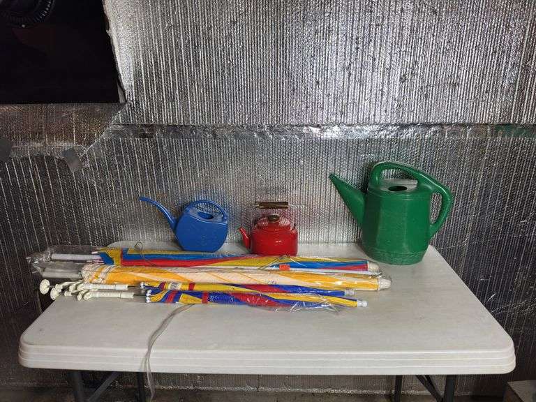 Umbrellas, Teapot, and Watering Cans.