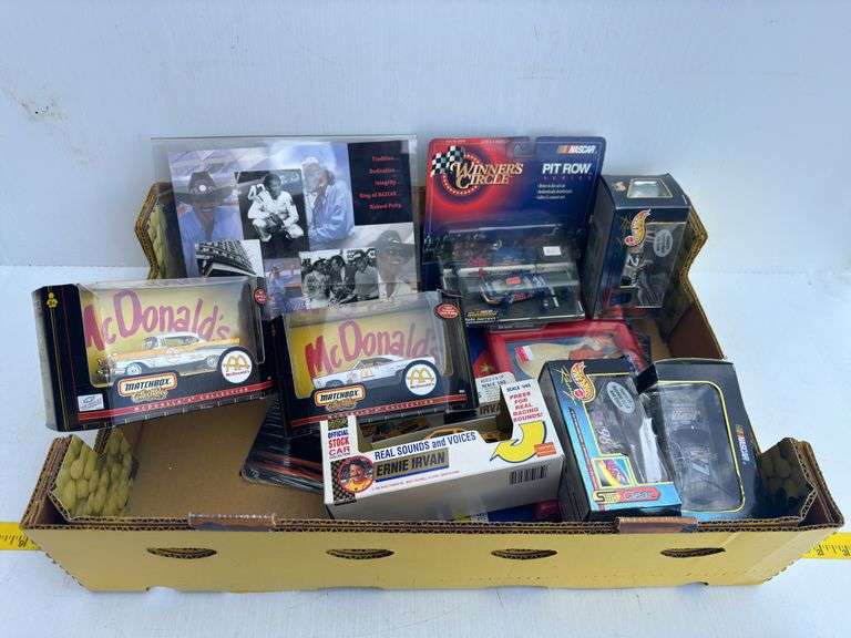 Assortment of NASCAR and Matchbox Toy Cars