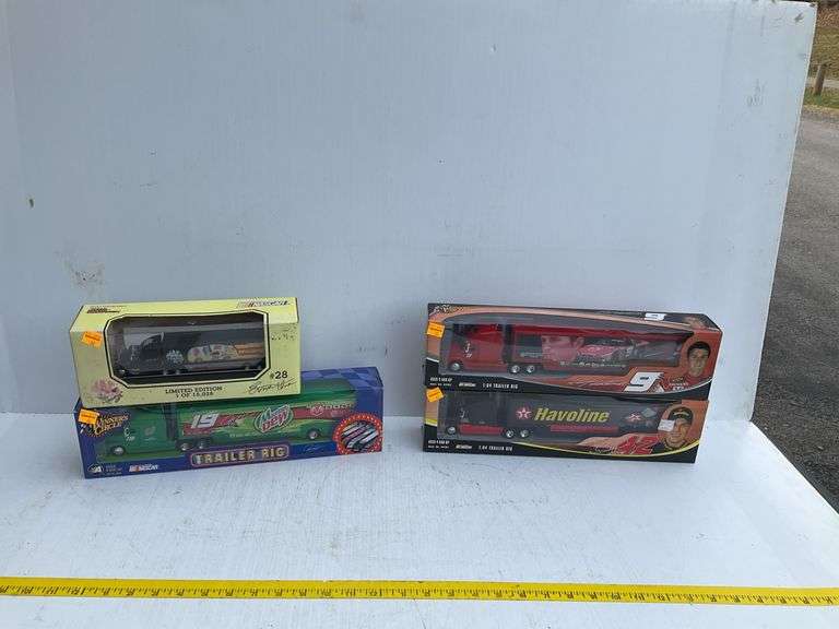 (4) NASCAR Die Cast Model Trailer Rigs