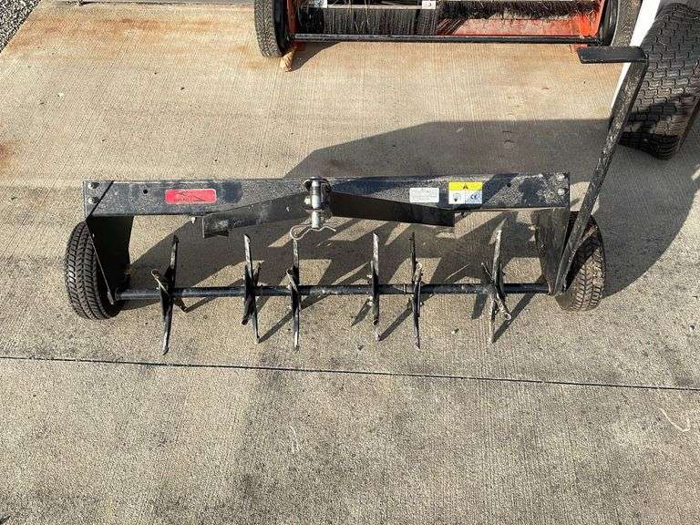 Brinly tow behind aerator w/ universal hitch