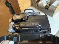 Untested Sears Roebuck VHS Movie Recorder & Elna Super Sewing Machine.