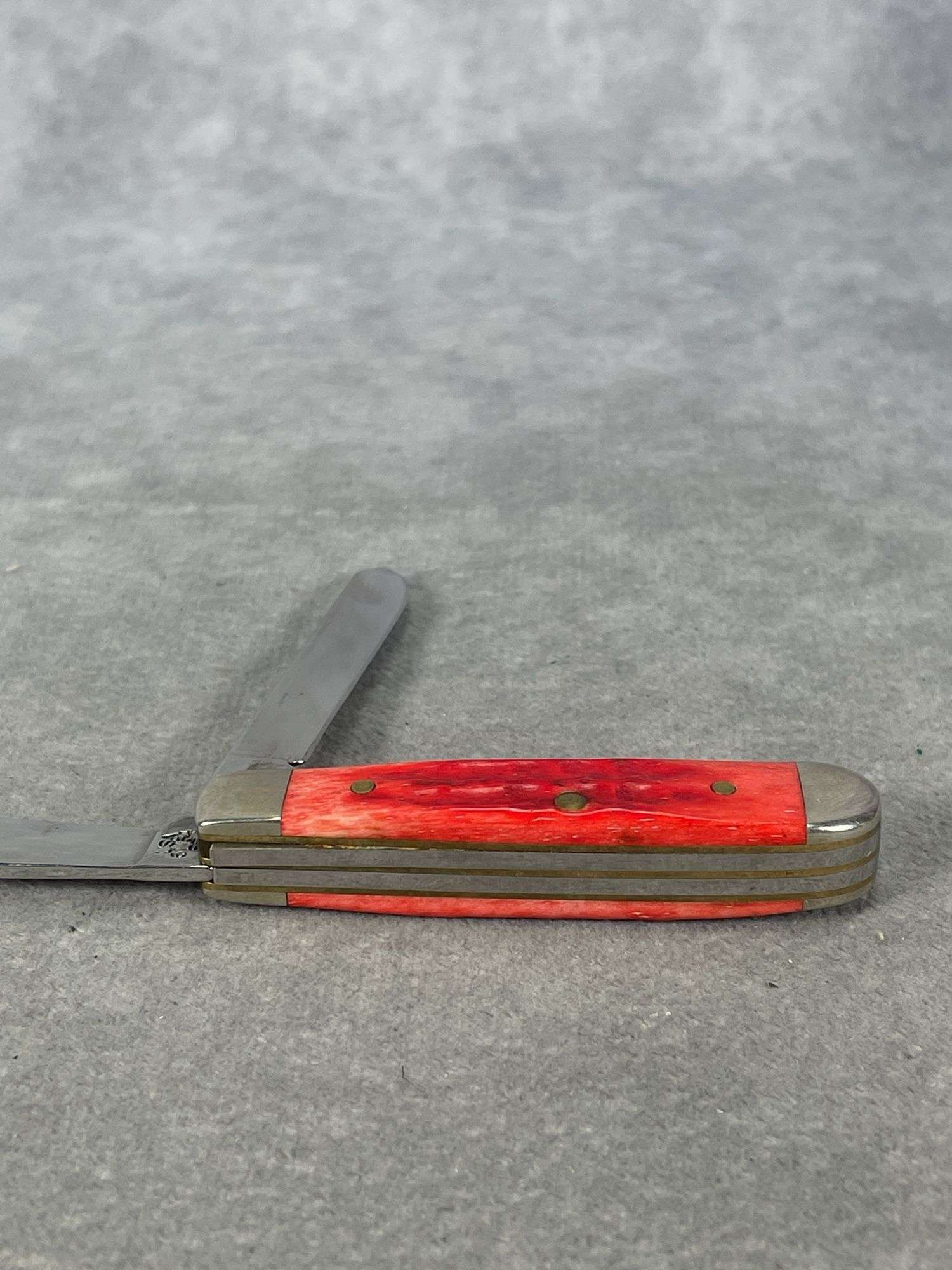 2004 CASE XX RED BONE TINY TRAPPER, TRUCK SHIELD