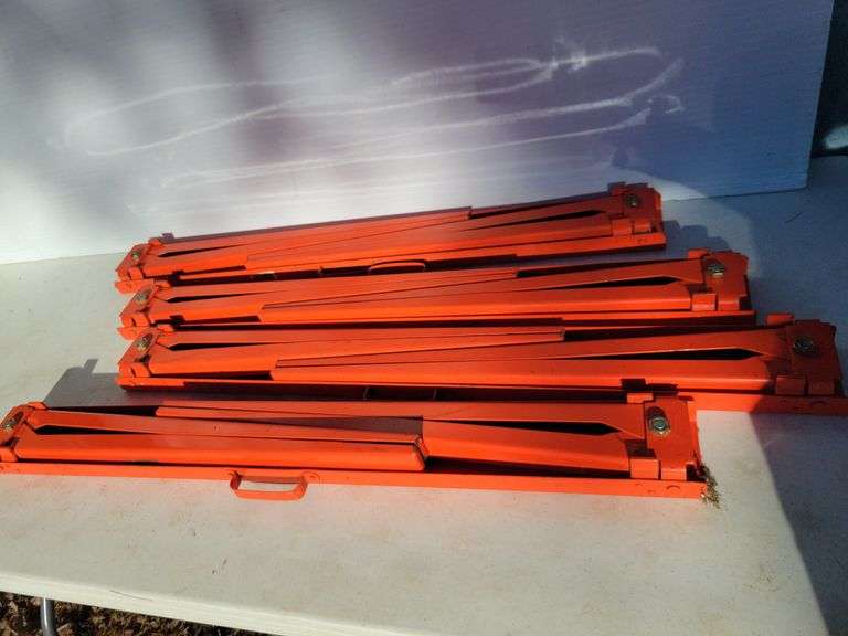 (2) sets folding sawhorses