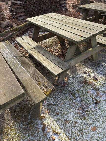 Two wood picnic tables