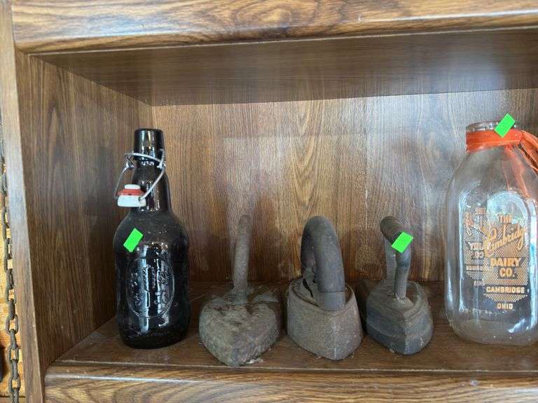 Antique irons and Cambridge dairy co bottle