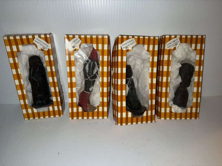 (4) Hand Carved Kenyan Statues