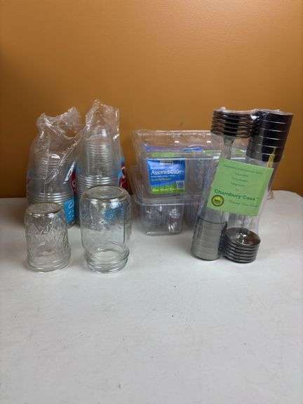 16 misc jars , tote of plastic cups , plastic ware