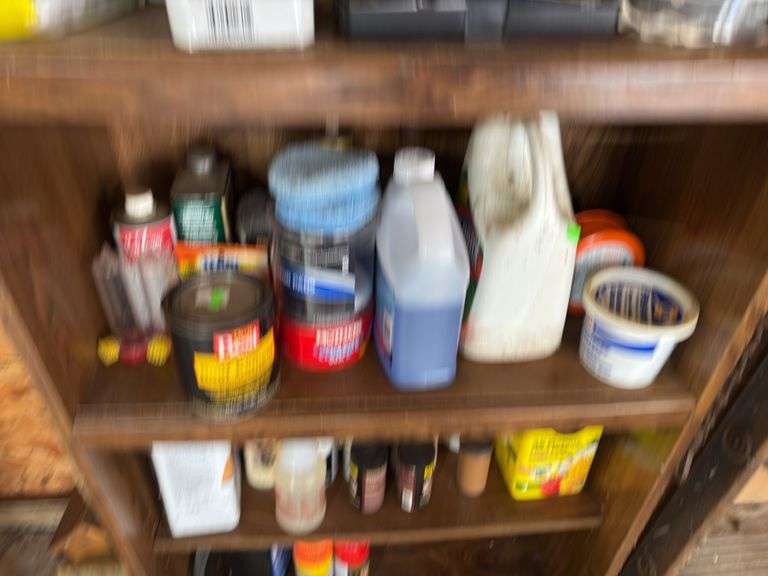 Contents of bottom shelves fluids and misc
