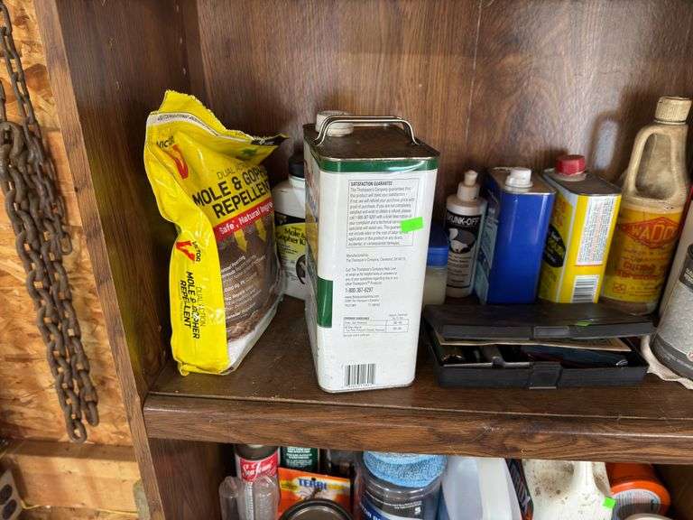 Contents of bottom shelves fluids and misc