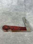 REMINGTON R1173L CUSTOM SPALTED RED OAK HANDLE 1-BLADE KNIFE