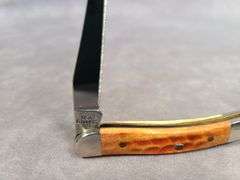 2006 CASE XX ORANGE BONE TINY TOOTHPICK