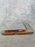 1998 CASE XX CHESTNUT BONE COPPERLOCK