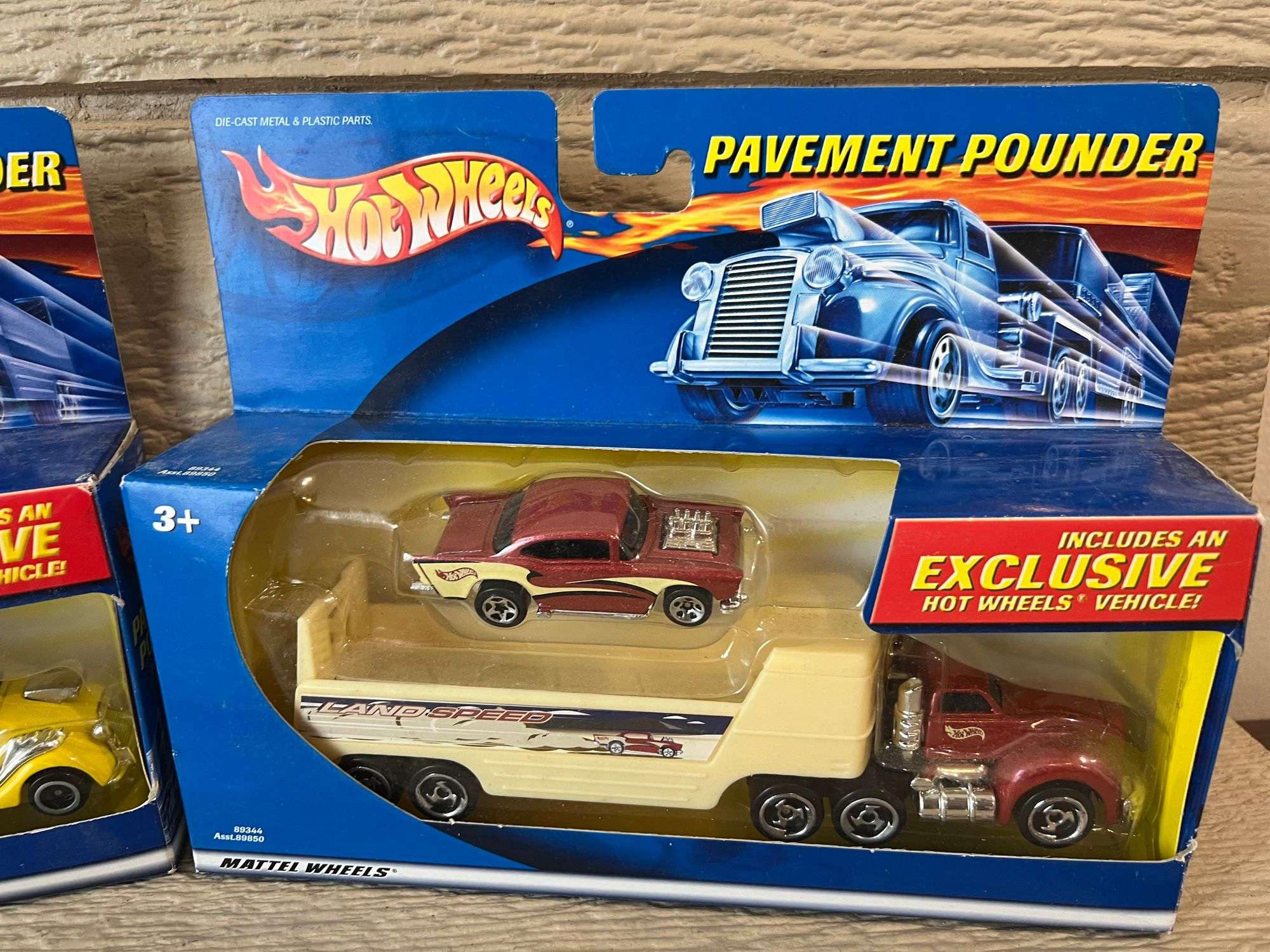 TWO 1/64 HOT WHEELS PAVEMENT POUNDERS - Kaufman Realty