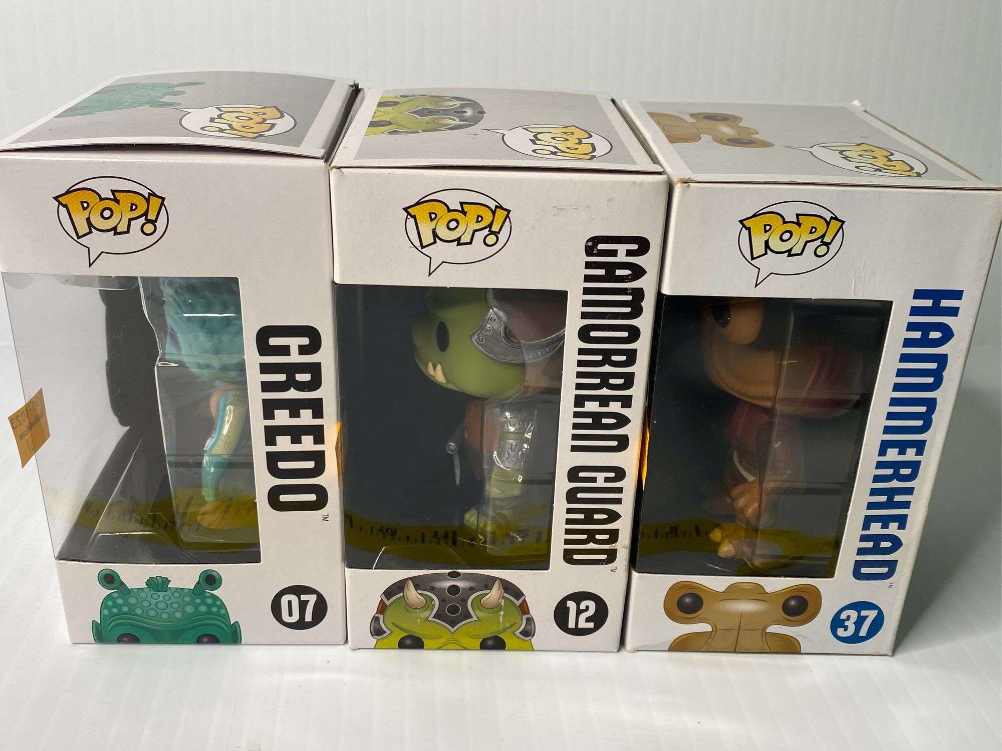 Star Wars Funko Pops Greedo 07, Gamorrean Guard 12, and