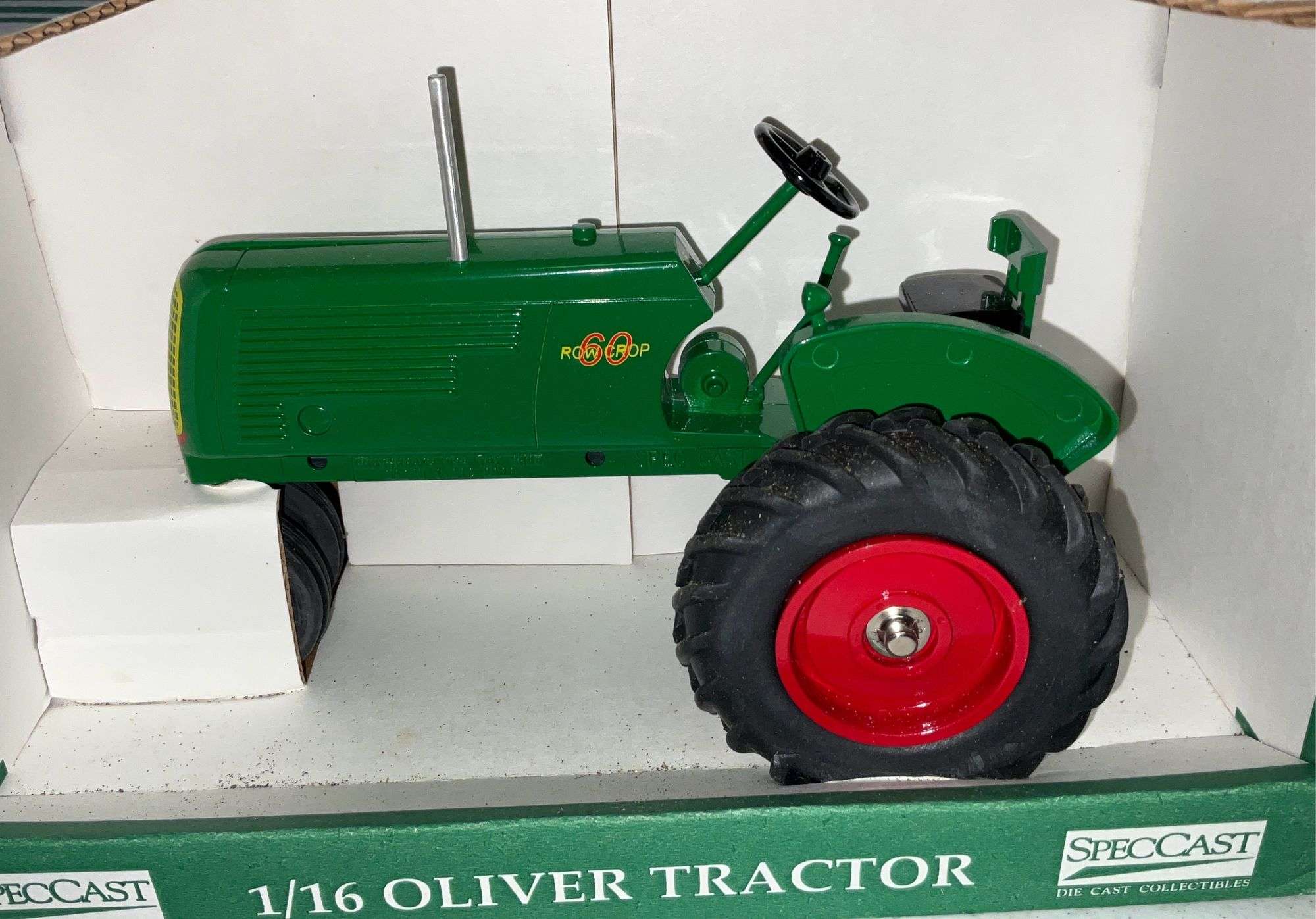 1/16 scale Oliver Row crop 60 tractor, NIB - Kaufman Realty & Auctions