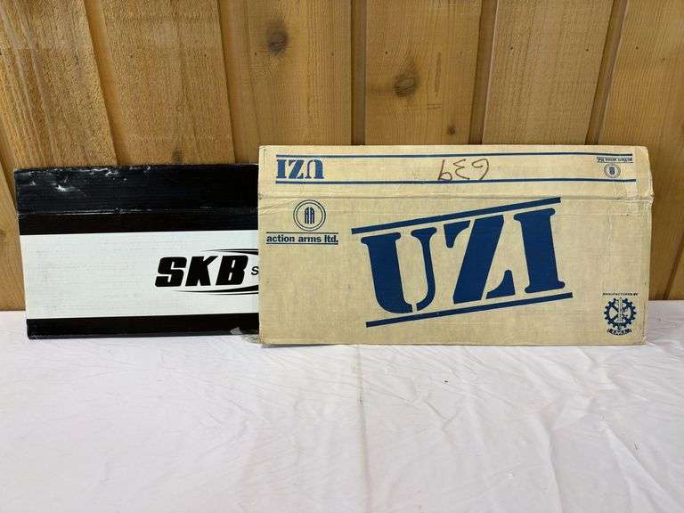 (2) Gun Box Covers. Uzi Action Arms and SKB Shotgun Box