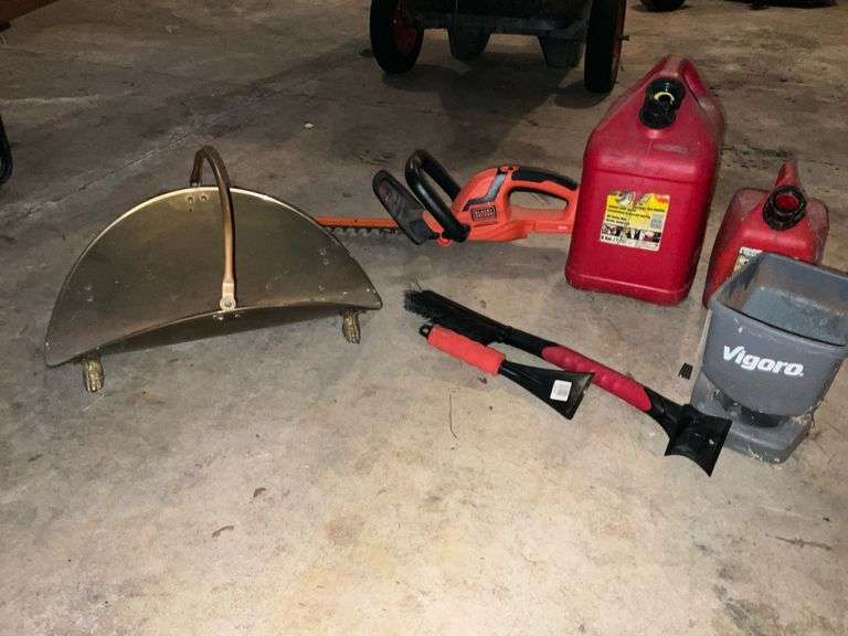 Gas cans, hedge trimmer, wood basket