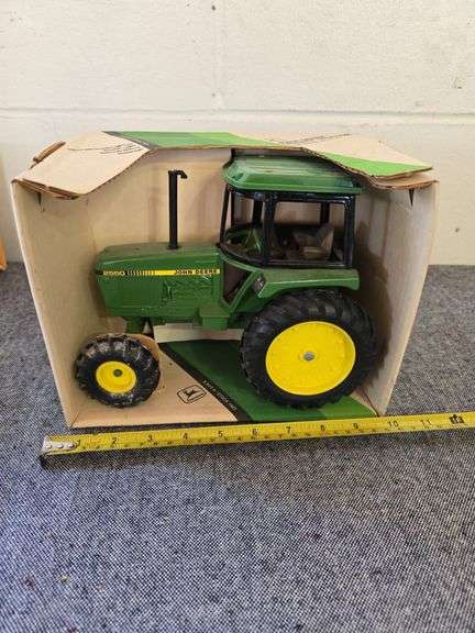 JOHN DEERE 2550 TRACTOR IN BOX
