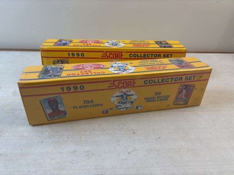 2 boxes baseball cards , 1 is still in plastic