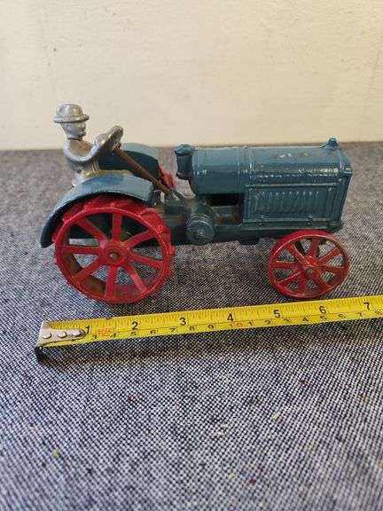 EARLY MCCORMICK DEERING TRACTOR WITH DRIVER