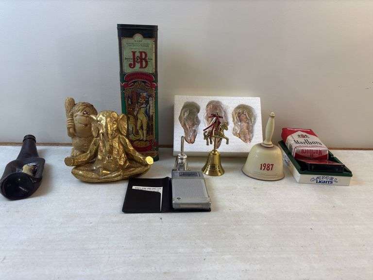 Dolls , bells , ash tray