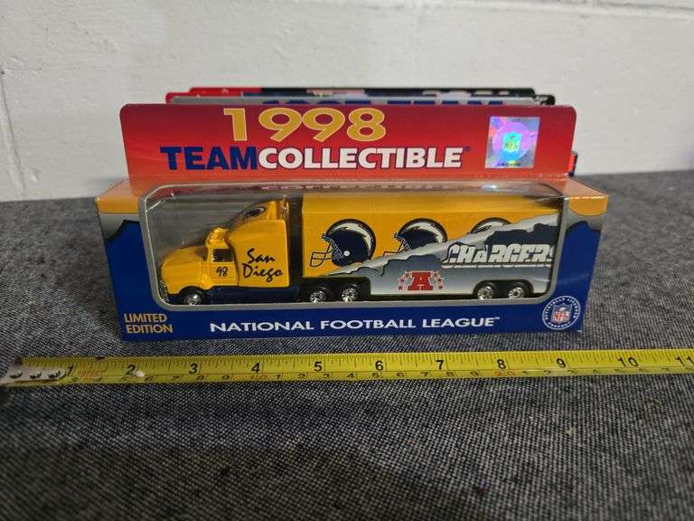 NFL CHARGERS DIE CAST TRUCKS NIB BID X 4