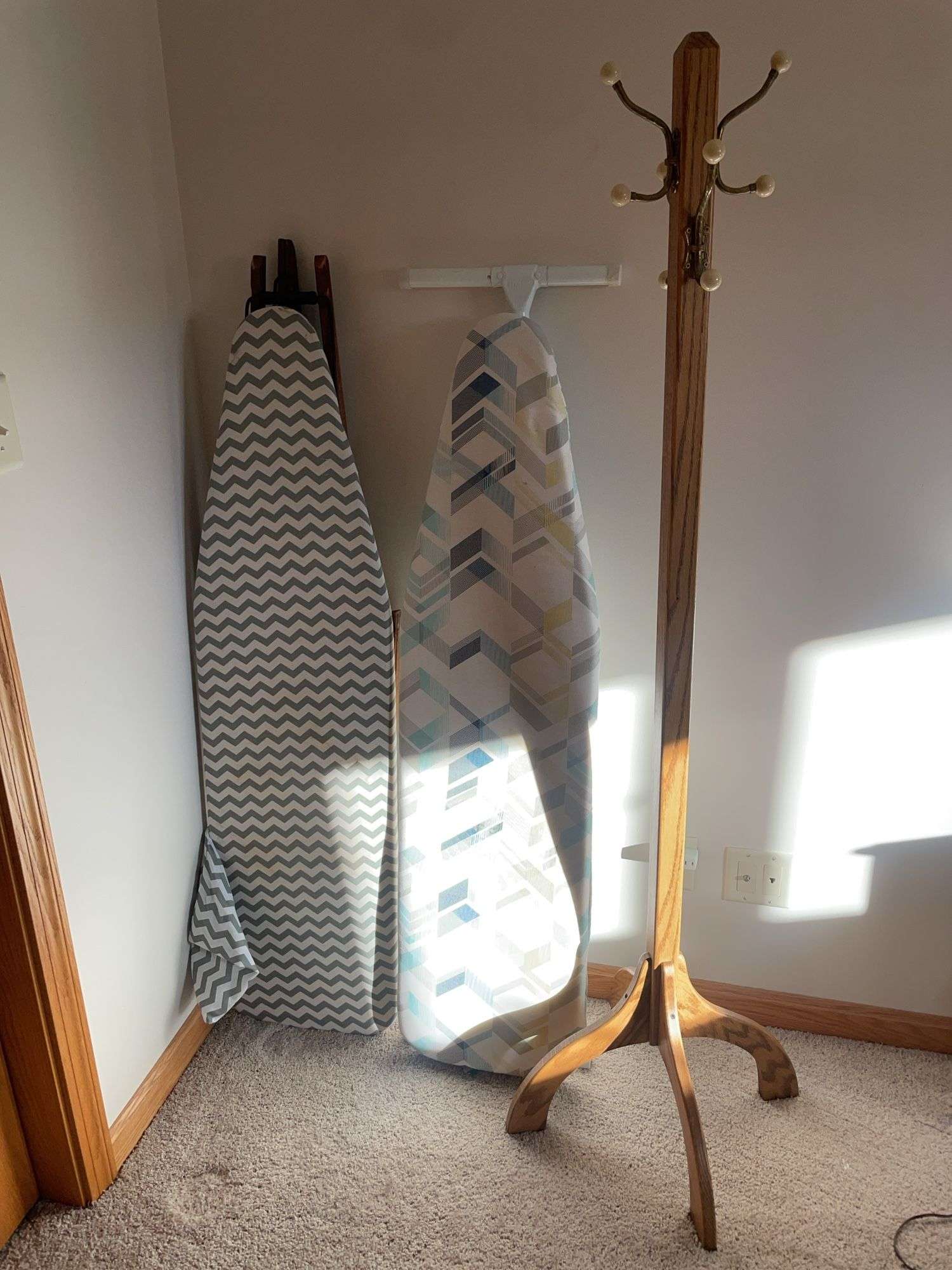 (2) ironing boards and coat tree