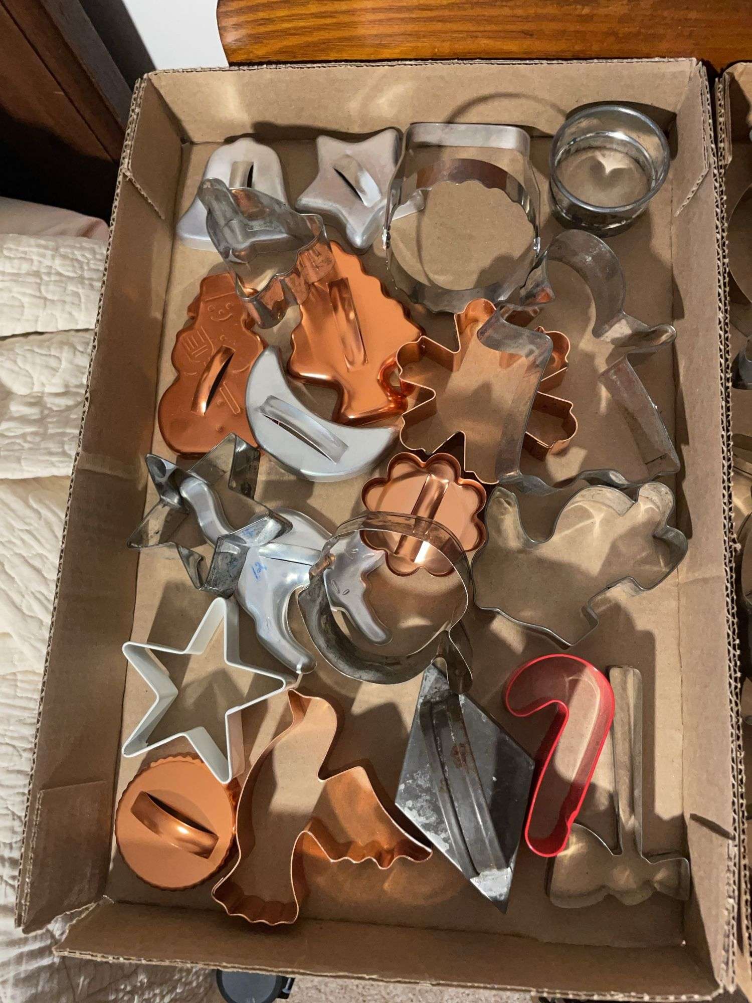 (2) flats of antique cookie cutters and icing dispensers