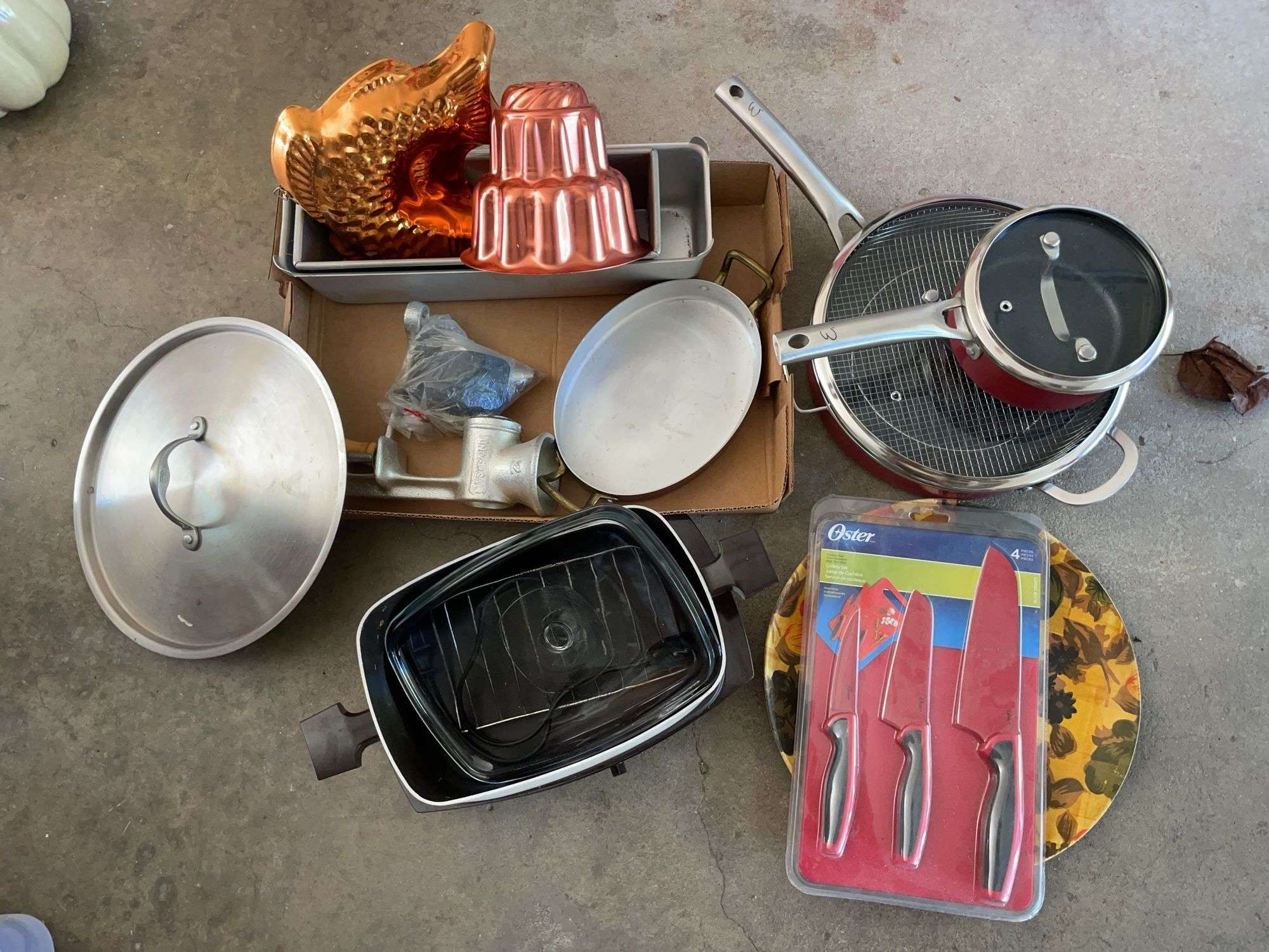 Kitchen lot including crock pot, frying pan, oster knife set & more