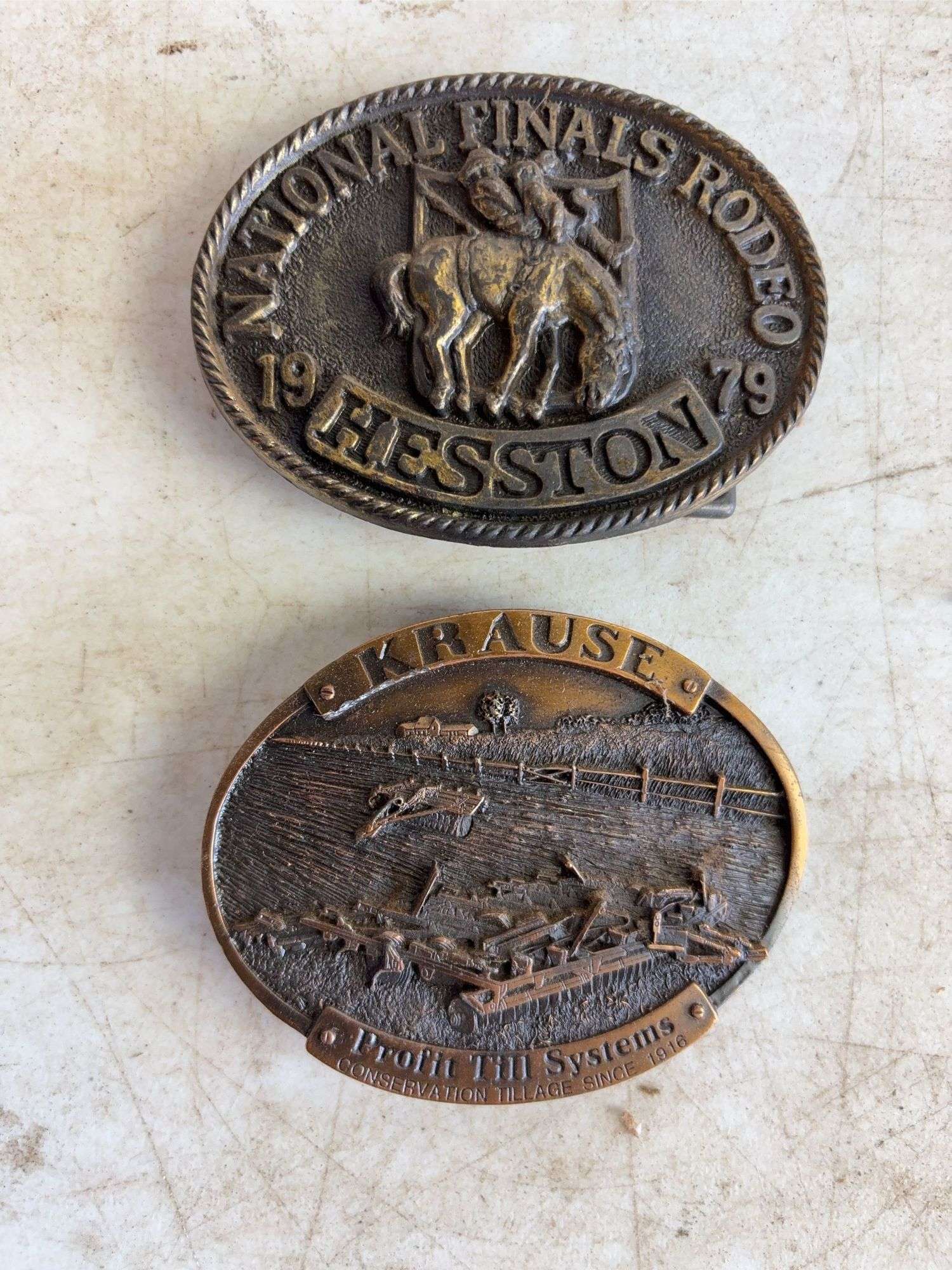 (10) belt buckles - (5) Krause and (5) Hesston