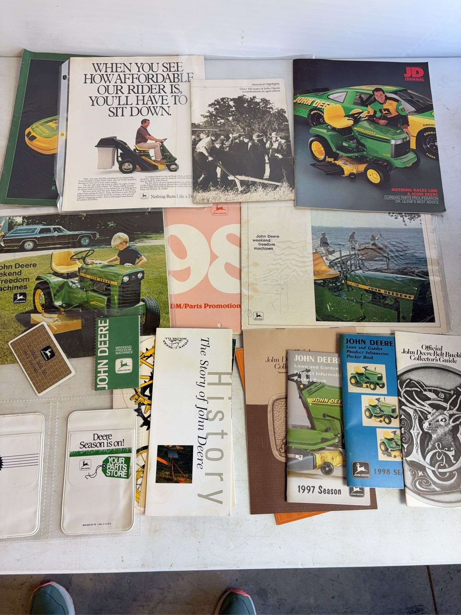 John Deere pocket books, promotion calendars, and other advertising booklets