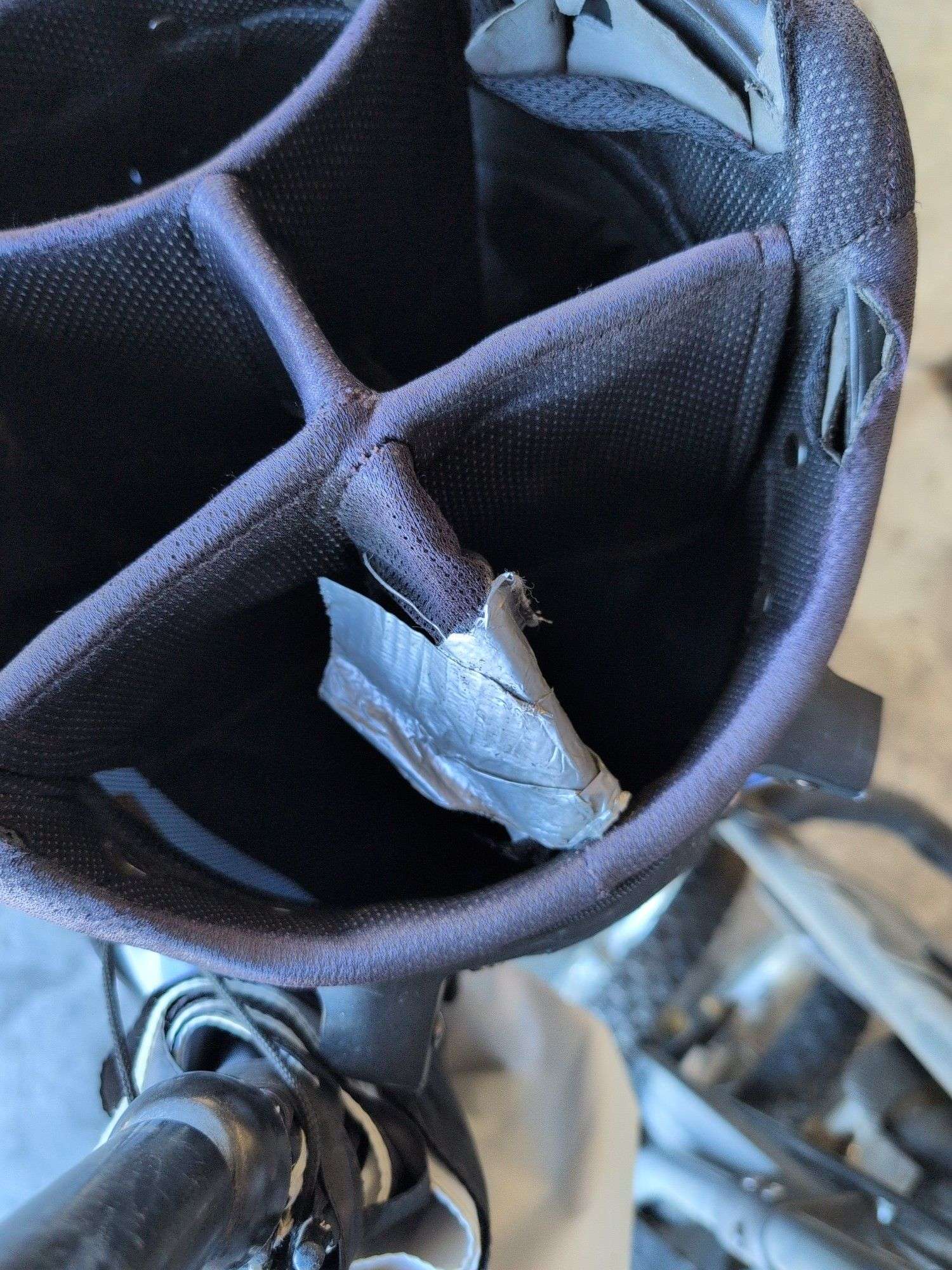 Wilson Staff golf bag and Sun Mountain bag carrier