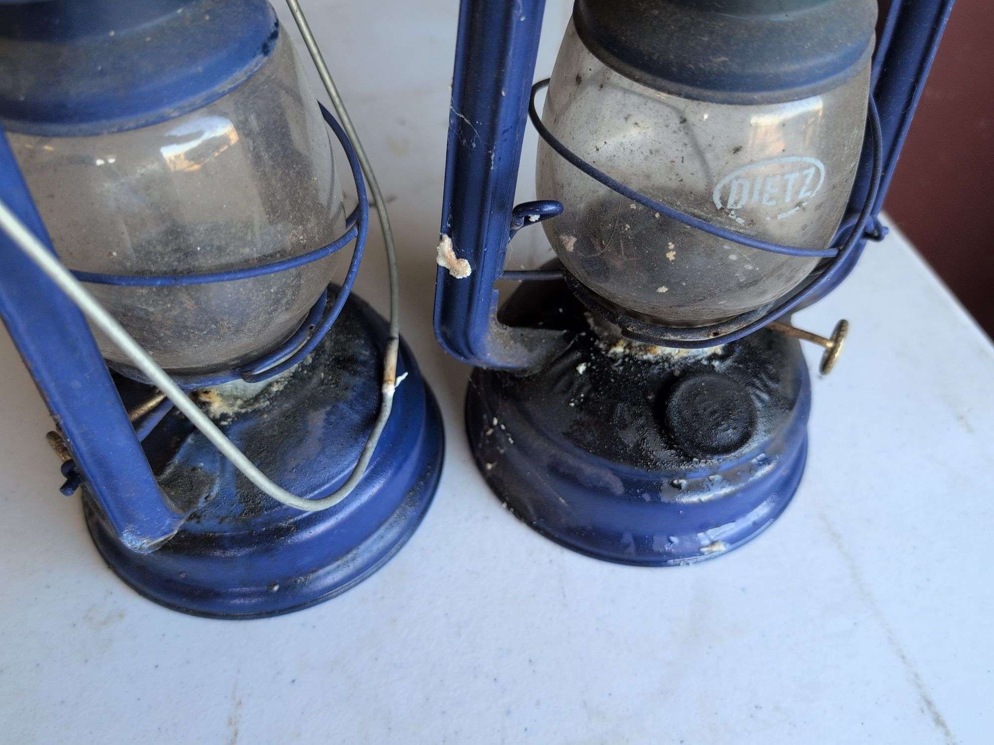(2) matching blue Dietz lanterns