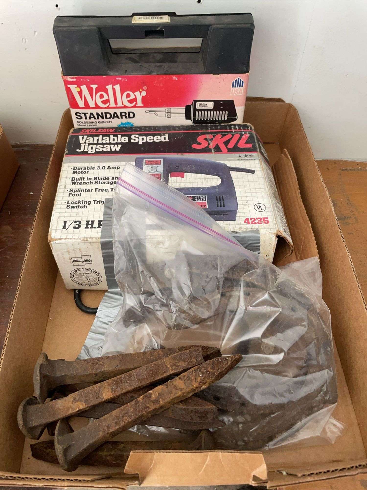 Weller soldering gun kit, skilsaw variable speed jigsaw, horseshoes & railroad spikes