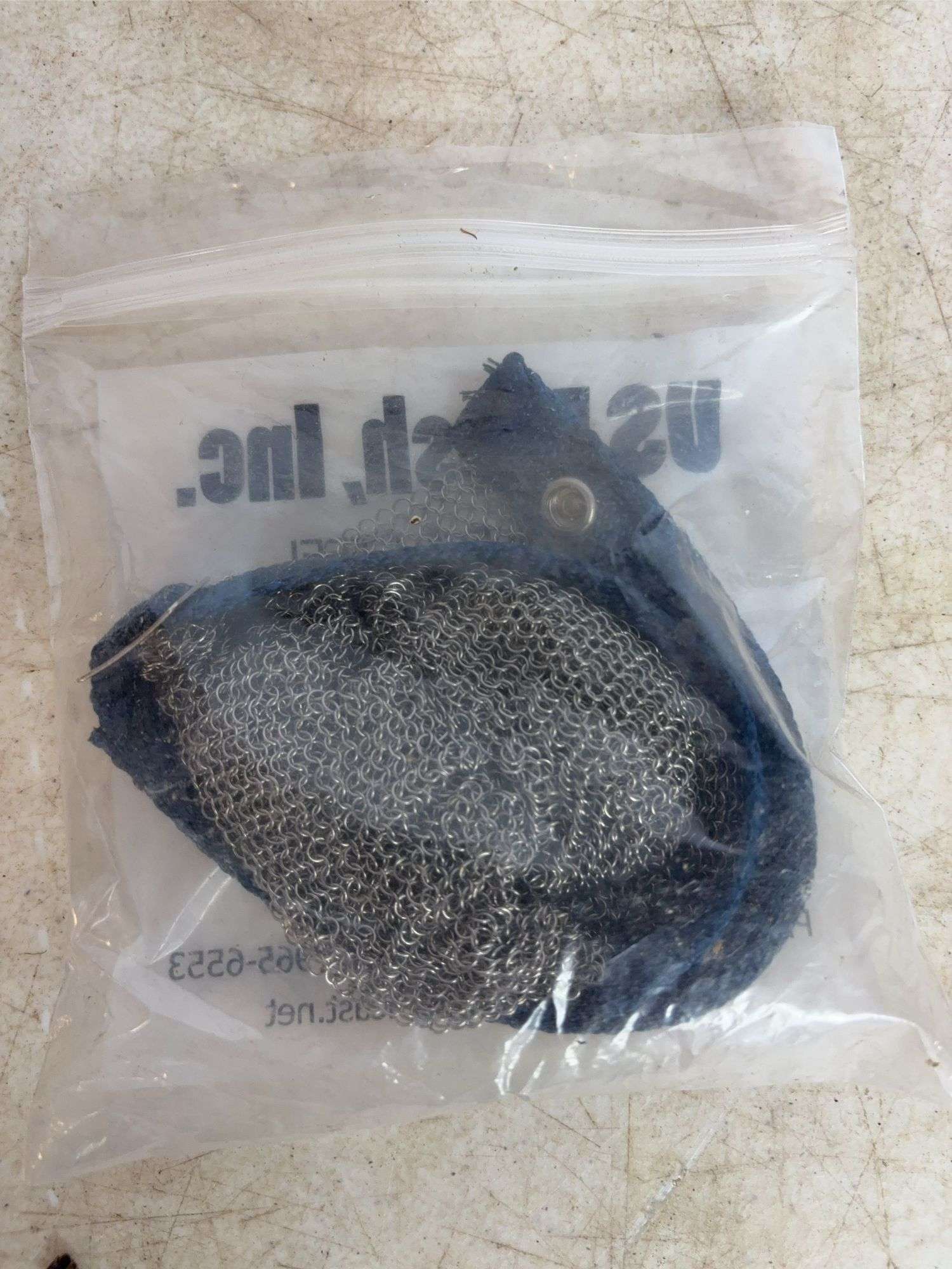 (2) machettes, Cabela's knife, and stainless mesh